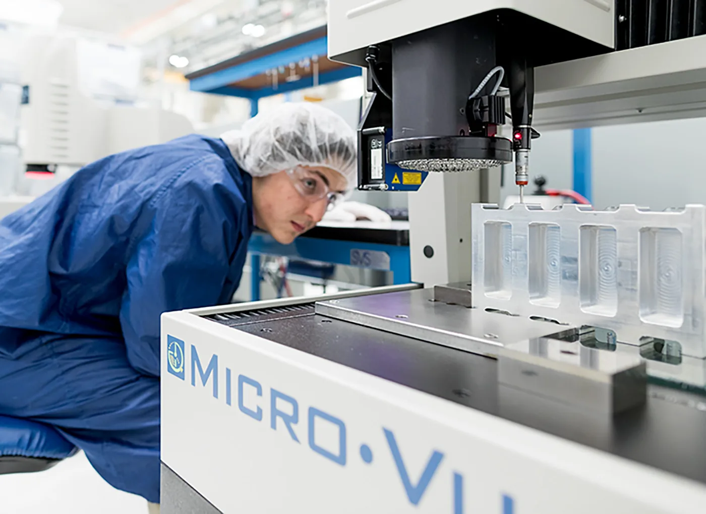 An engineer at a vision metrology station